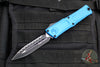 Microtech Combat Troodon Gen III OTF Knife- Double Edge- Blue Handle- Black Full Serrated Edge Blade 1142-3 BL Gen III