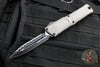 Microtech Combat Troodon Gen III OTF Knife- Double Edge- Natural Clear Finished Handle- Black Full Serrated Edge Blade 1142-3 NC Gen III 2024
