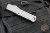 Microtech Combat Troodon Gen III OTF Knife- Bowie Edge- Natural Clear Finished Handle- Stonewash Plain Edge Blade 1146-10 NC Gen III