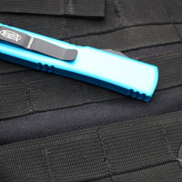 Microtech Ultratech OTF Knife- Bayonet Edge- Turquoise Handle- Black Plain Edge Blade 120-1 TQ