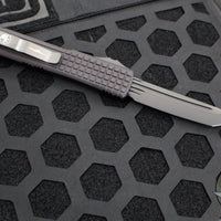 Microtech Ultratech OTF Knife- Delta- Tanto Edge- Frag Black Handle- Black DLC Plain Edge Blade- DLC HW- Nickel Boron Internals 123-1UT-DS
