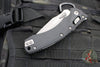 Microtech Knives- Amphibian Ram-Lok Folder- Fluted Black G-10 Handle- Apocalyptic Part Serrated Edge Blade 137RL-11 APFLGTBK