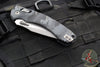 Microtech Knives- Amphibian Ram-Lok Folder- Fluted Urban Camo Finished Aluminum Handle- Urban Camo Finished Plain Edge Blade- Apocalyptic Finished Hardware 137RL-10 APFLUCS