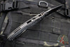 Microtech Knives- Amphibian Ram-Lok Folder- Fluted Carbon Fiber Handle- Black DLC Plain Edge Blade 137RL-1 DLCTFLCFS