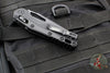 Microtech Knives- M.S.I. Ram-Lok Folder- Tactical- Black Tri-Grip Injection Molded Handle- Black Plain Edge Blade- Black Hardware 210T-1 TPM