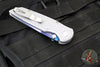 Protech TR-3 Integrity- Manual Button Lock Knife- BLADE SHOW 2025- Relic Pattern Battleship Grey Handle- Sapphire Blue S35VN Steel Blade- Abalone Button BSA25.INT.1