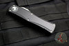 PREOWNED- Microtech Hera OTF Knife- Double Edge- Black Handle- Stonewash Full Serrated Blade 702-12 PREOWNED