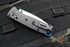 Benchmade Mini Bugout- Carbon Fiber Handle- Stonewash Plain Edge- Blue Thumbstud and Backspacer 533-3