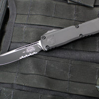 Microtech Ultratech ZBP Zero Blade Play OTF Knife- Single Edge- Tactical- Black Handle- Black Part Serrated Blade 1121-2 T