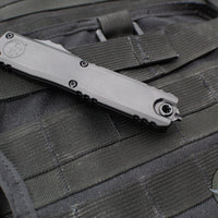 Microtech Ultratech ZBP Zero Blade Play OTF Knife- Double Edge- Tactical- Black Handle- Black Plain Edge Blade 1122-1 T