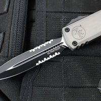 Microtech Ultratech ZBP Zero Blade Play OTF Knife- Double Edge- Natural Clear Finished Handle- Black Part Serrated Edge Blade 1122-2 NC