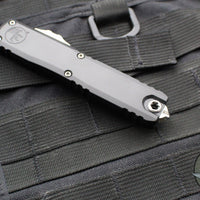 Microtech Ultratech ZBP Zero Blade Play OTF Knife- Tanto Edge- Black Handle- Stonewash Part Serrated Blade 1123-11