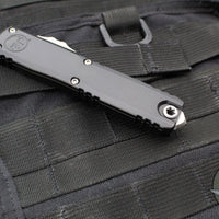 Microtech Ultratech ZBP Zero Blade Play OTF Knife- Tanto Edge- Black Handle- Apocalyptic Full Serrated Blade 1123-12 AP