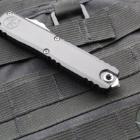 Microtech Ultratech ZBP Zero Blade Play OTF Knife- Tanto Edge- Black Handle- Stonewash Full Serrated Blade 1123-12