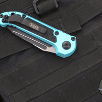 Microtech 2024 LUDT OTS Knife- Tanto Edge- Turquoise Handle- Black Part Serrated Blade 1136-2 TQ