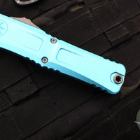 Microtech Combat Troodon Gen III OTF Knife- Double Edge- Turquoise Handle- Apocalyptic Part Serrated Blade 1142-11 APTQ Gen III 2024