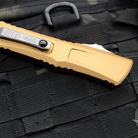 Microtech Combat Troodon Gen III OTF Knife- Double Edge- Tan Handle- Stonewash Part Serrated Blade 1142-11 TA Gen III 2024