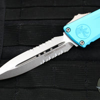 Microtech Combat Troodon Gen III OTF Knife- Double Edge- Turquoise Handle- Stonewash Part Serrated Blade 1142-11 TQ Gen III