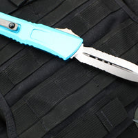 Microtech Combat Troodon Gen III OTF Knife- Double Edge- Turquoise Handle- Stonewash Part Serrated Blade 1142-11 TQ Gen III