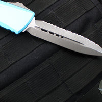 Microtech Combat Troodon Gen III OTF Knife- Double Edge- Turquoise Handle- Apocalyptic Full Serrated Blade 1142-12 APTQ Gen III 2024