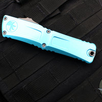 Microtech Combat Troodon Gen III OTF Knife- Double Edge- Turquoise Handle- Apocalyptic Full Serrated Blade 1142-12 APTQ Gen III 2024