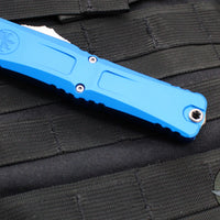 Microtech Combat Troodon Gen III OTF Knife- Double Edge- Blue Handle- Stonewash Full Serrated Blade 1142-12 BL Gen III 2024