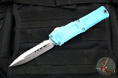 Microtech Combat Troodon Gen III OTF Knife- Double Edge- Turquoise Handle- Stonewash Full Serrated Blade 1142-12 TQ Gen III