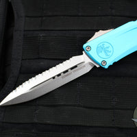 Microtech Combat Troodon Gen III OTF Knife- Double Edge- Turquoise Handle- Stonewash Full Serrated Blade 1142-12 TQ Gen III