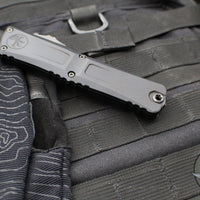 Microtech Combat Troodon Gen III OTF Knife- Double Edge-Shadow Edition- Black Handle- Black DLC Plain Edge Blade 1142-1 DLCTSH Gen III
