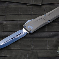 Microtech Combat Troodon Gen III OTF Knife- Double Edge- Black Finished Handle- Blue Plain Edge Blade And Accents 1142-1 NASK GEN III