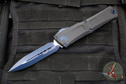 Microtech Combat Troodon Gen III OTF Knife- Double Edge- Black Finished Handle- Blue Plain Edge Blade And Accents 1142-1 NASK GEN III