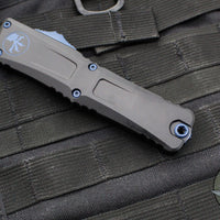 Microtech Combat Troodon Gen III OTF Knife- Double Edge- Black Finished Handle- Blue Plain Edge Blade And Accents 1142-1 NASK GEN III