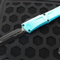 Microtech Combat Troodon Gen III OTF Knife- Double Edge- Turquoise Handle- Black Plain Edge Blade 1142-1 TQ Gen III