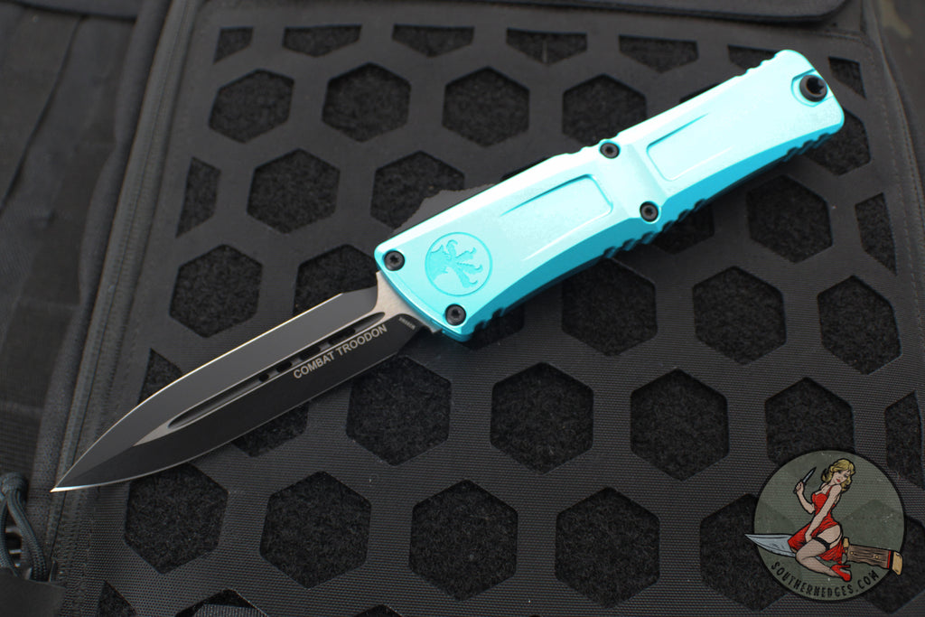 Microtech Combat Troodon Gen III OTF Knife- Double Edge- Turquoise Handle- Black Plain Edge Blade 1142-1 TQ Gen III