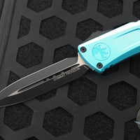 Microtech Combat Troodon Gen III OTF Knife- Double Edge- Turquoise Handle- Black Plain Edge Blade 1142-1 TQ Gen III