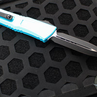 Microtech Combat Troodon Gen III OTF Knife- Double Edge- Turquoise Handle- Black Plain Edge Blade 1142-1 TQ Gen III