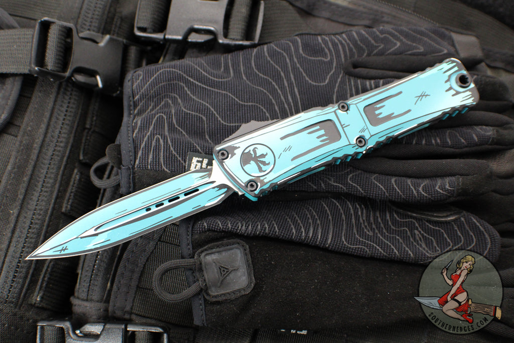 Microtech Combat Troodon Gen III OTF Knife- Double Edge- Turquoise Cel Shade Finished Handle- Turquoise Cel Shade Plain Edge Blade 1142-1 TQCOMICS GEN III