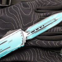 Microtech Combat Troodon Gen III OTF Knife- Double Edge- Turquoise Cel Shade Finished Handle- Turquoise Cel Shade Plain Edge Blade 1142-1 TQCOMICS GEN III