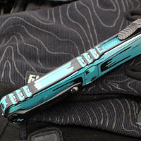 Microtech Combat Troodon Gen III OTF Knife- Double Edge- Turquoise Cel Shade Finished Handle- Turquoise Cel Shade Plain Edge Blade 1142-1 TQCOMICS GEN III