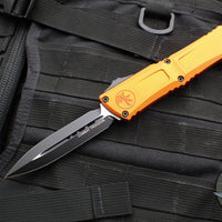 Microtech Combat Troodon Gen III OTF Knife- Double Edge- Orange Handle- Black Plain Edge Blade 1142-1 OR Gen III