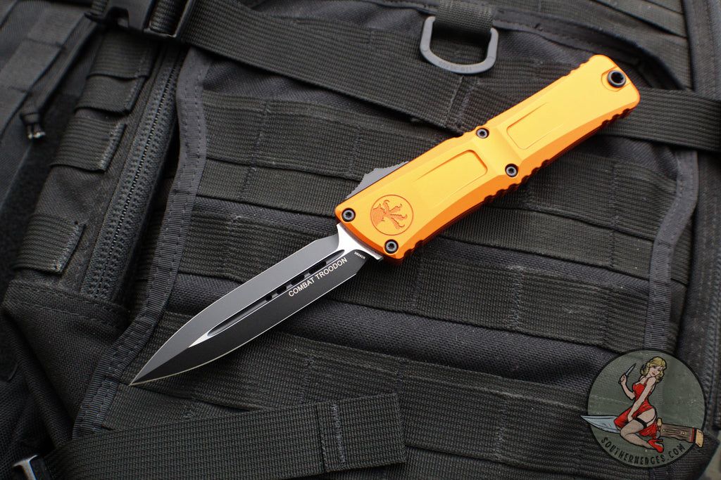 Microtech Combat Troodon Gen III OTF Knife- Double Edge- Orange Handle- Black Plain Edge Blade 1142-1 OR Gen III