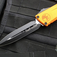 Microtech Combat Troodon Gen III OTF Knife- Double Edge- Orange Handle- Black Plain Edge Blade 1142-1 OR Gen III