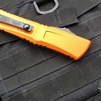 Microtech Combat Troodon Gen III OTF Knife- Double Edge- Orange Handle- Black Plain Edge Blade 1142-1 OR Gen III