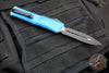 Microtech Combat Troodon Gen III OTF Knife- Double Edge- Blue Handle- Black Part Serrated Edge Blade 1142-2 BL Gen III 2024