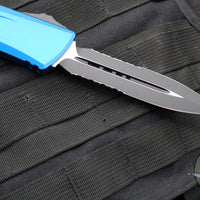 Microtech Combat Troodon Gen III OTF Knife- Double Edge- Blue Handle- Black Part Serrated Edge Blade 1142-2 BL Gen III 2024