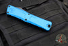 Microtech Combat Troodon Gen III OTF Knife- Double Edge- Blue Handle- Black Part Serrated Edge Blade 1142-2 BL Gen III 2024