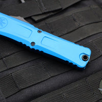 Microtech Combat Troodon Gen III OTF Knife- Double Edge- Blue Handle- Black Part Serrated Edge Blade 1142-2 BL Gen III 2024