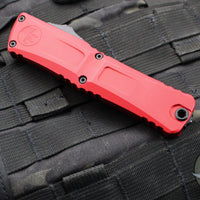 Microtech Combat Troodon Gen III OTF Knife- Double Edge- Red Handle- Black Part Serrated Edge Blade 1142-2 RD Gen III 2024