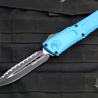 Microtech Combat Troodon Gen III OTF Knife- Double Edge- Blue Handle- Black Full Serrated Edge Blade 1142-3 BL Gen III 2024