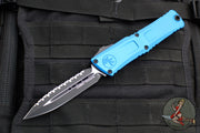 Microtech Combat Troodon Gen III OTF Knife- Double Edge- Blue Handle- Black Full Serrated Edge Blade 1142-3 BL Gen III